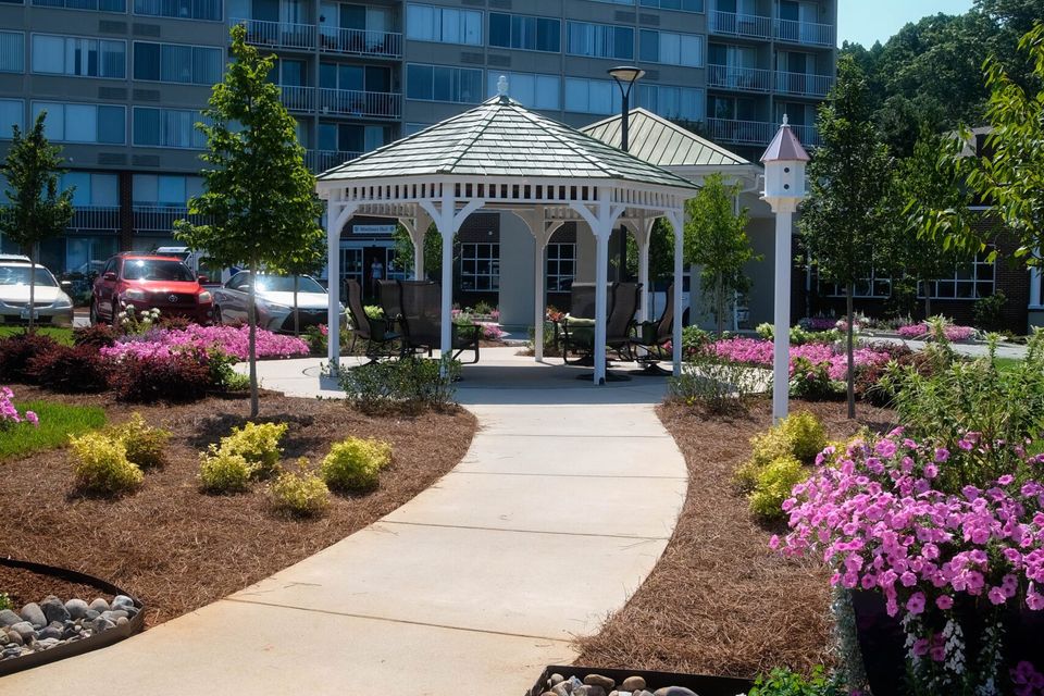 Commercial landscaping in Greensboro, North Carolina — professional maintained property landscaping.